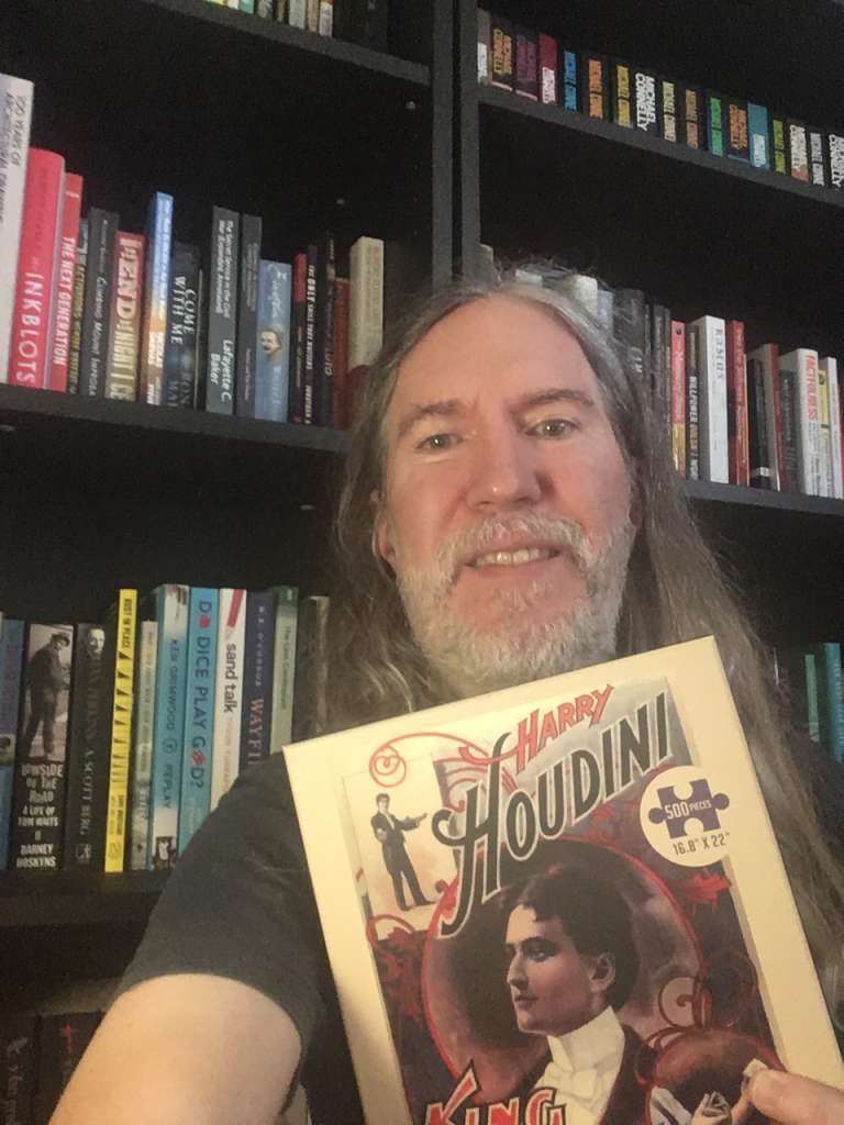 Anthony Metivier with a Houdini puzzle used for authentic brain exercise