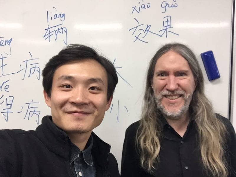 Anthony Metivier with his Mandarin teacher