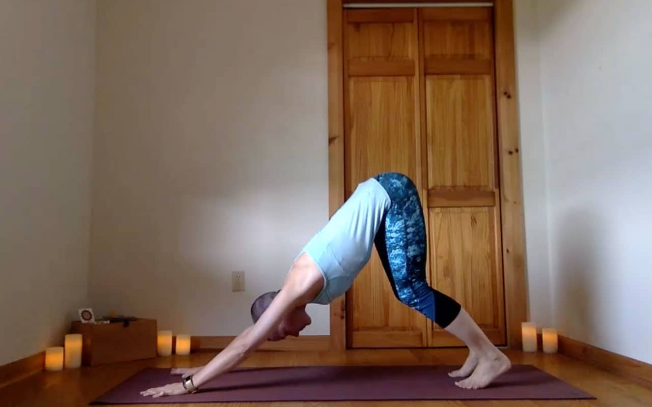 The post author demonstrates Adho Mukha Svanasana (Downward Facing Dog).