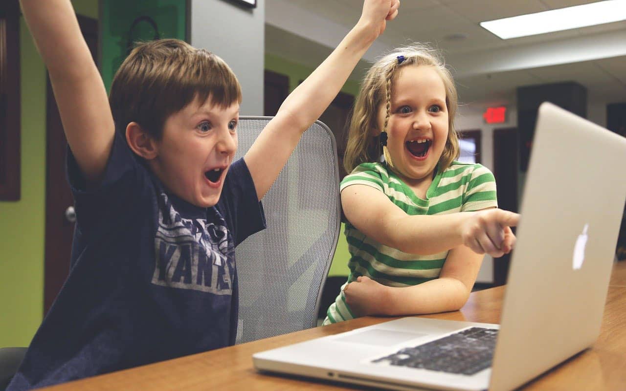 Memory Games: set a goal, like these kids playing a computer game to win.