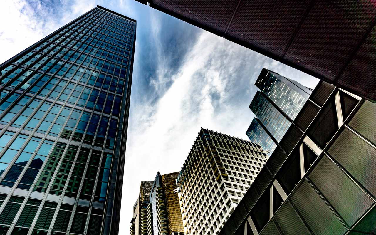 A view looking up at skyscrapers, showing the angles in city buildings.