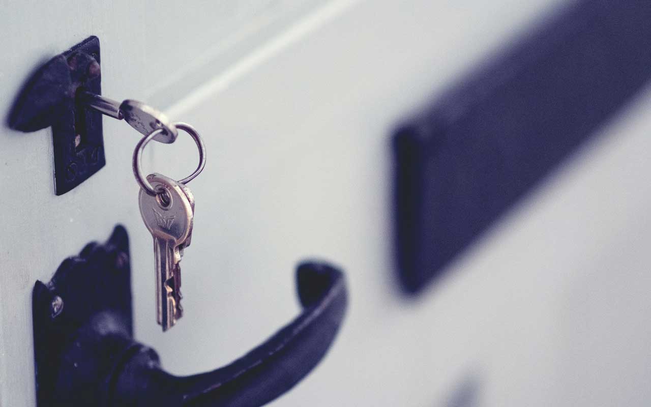 A set of house keys, forgotten in a lock. An example of basic forgetfulness, not memory disorders.