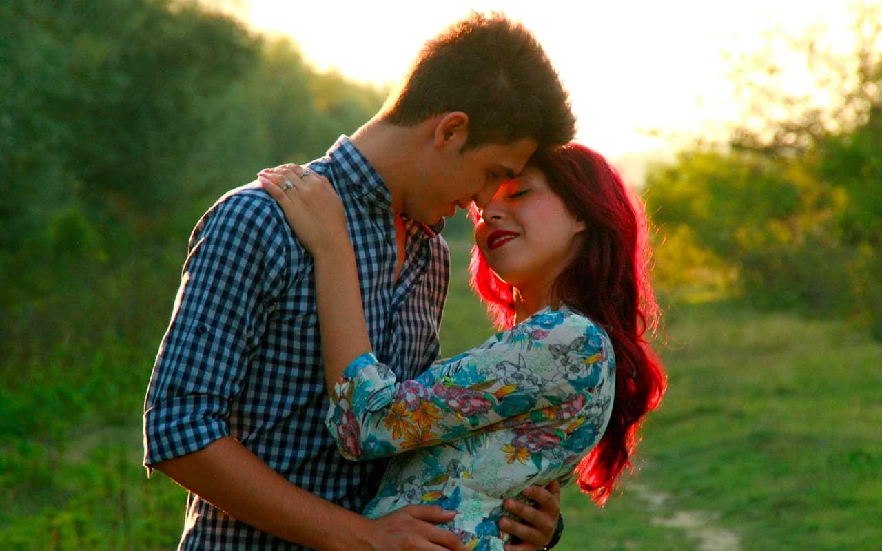 a couple singing to one another