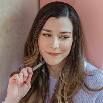 Memory improvement tips feature image of a woman reflecting