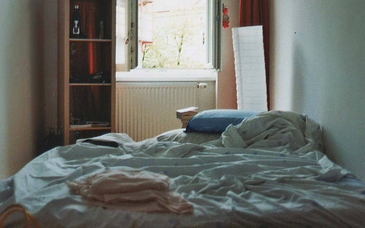 A messy, unmade bed - a metaphor for a messy brain.
