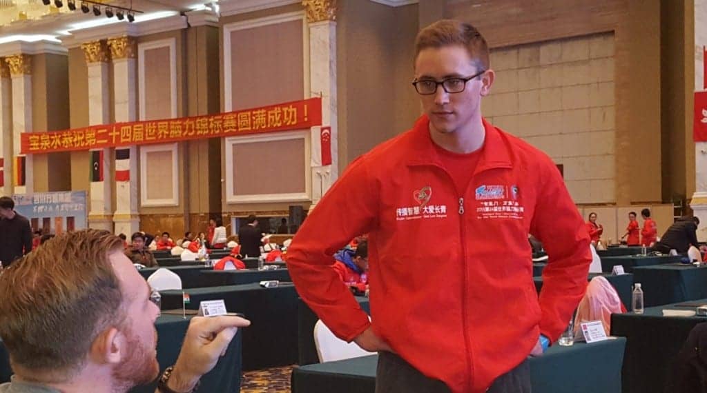 Alex Mullen listening to memory champion Nelson Dellis