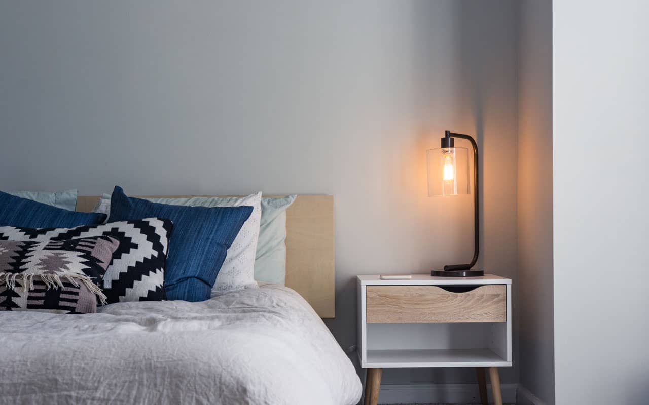 Get a good night's sleep to help regulate your selective attention. Photo of quiet bedroom.