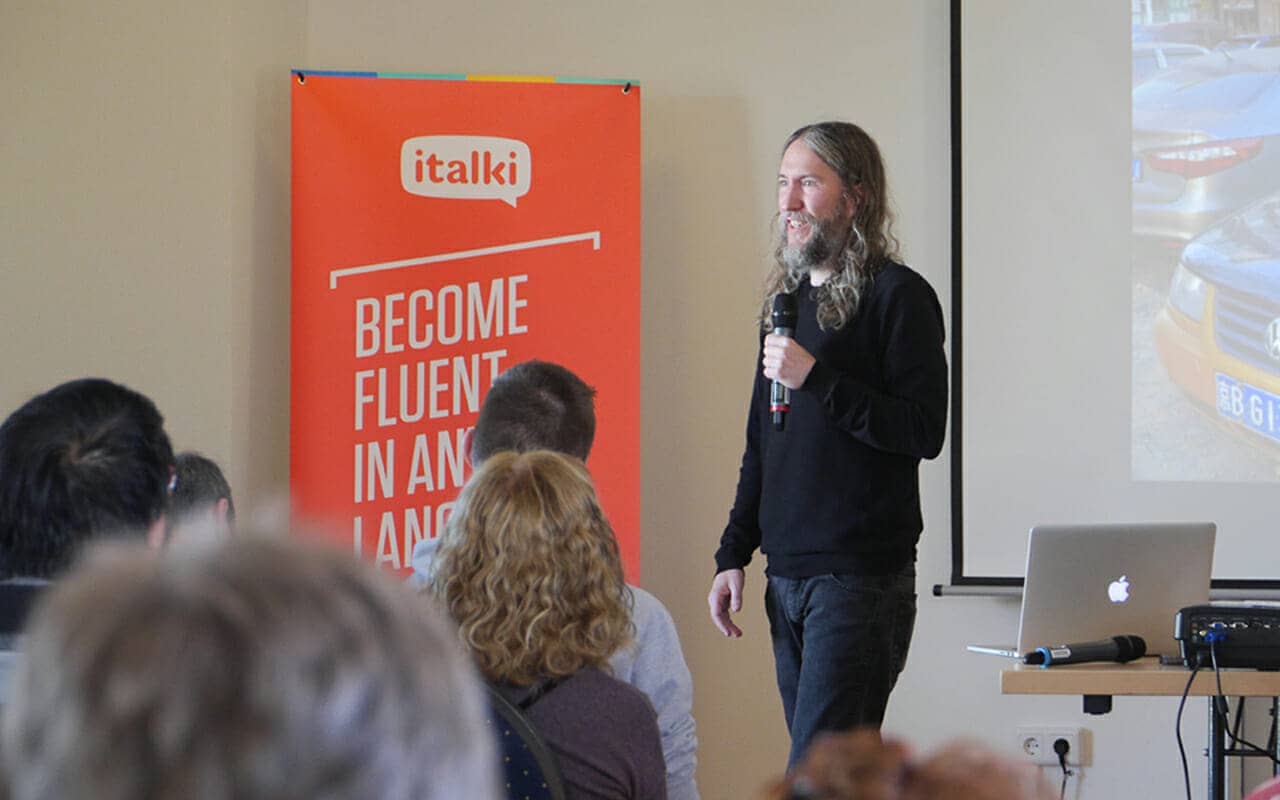 tips for memorizing a speech examples from Dr. Anthony Metivier delivering a presentation in Berlin, Germany