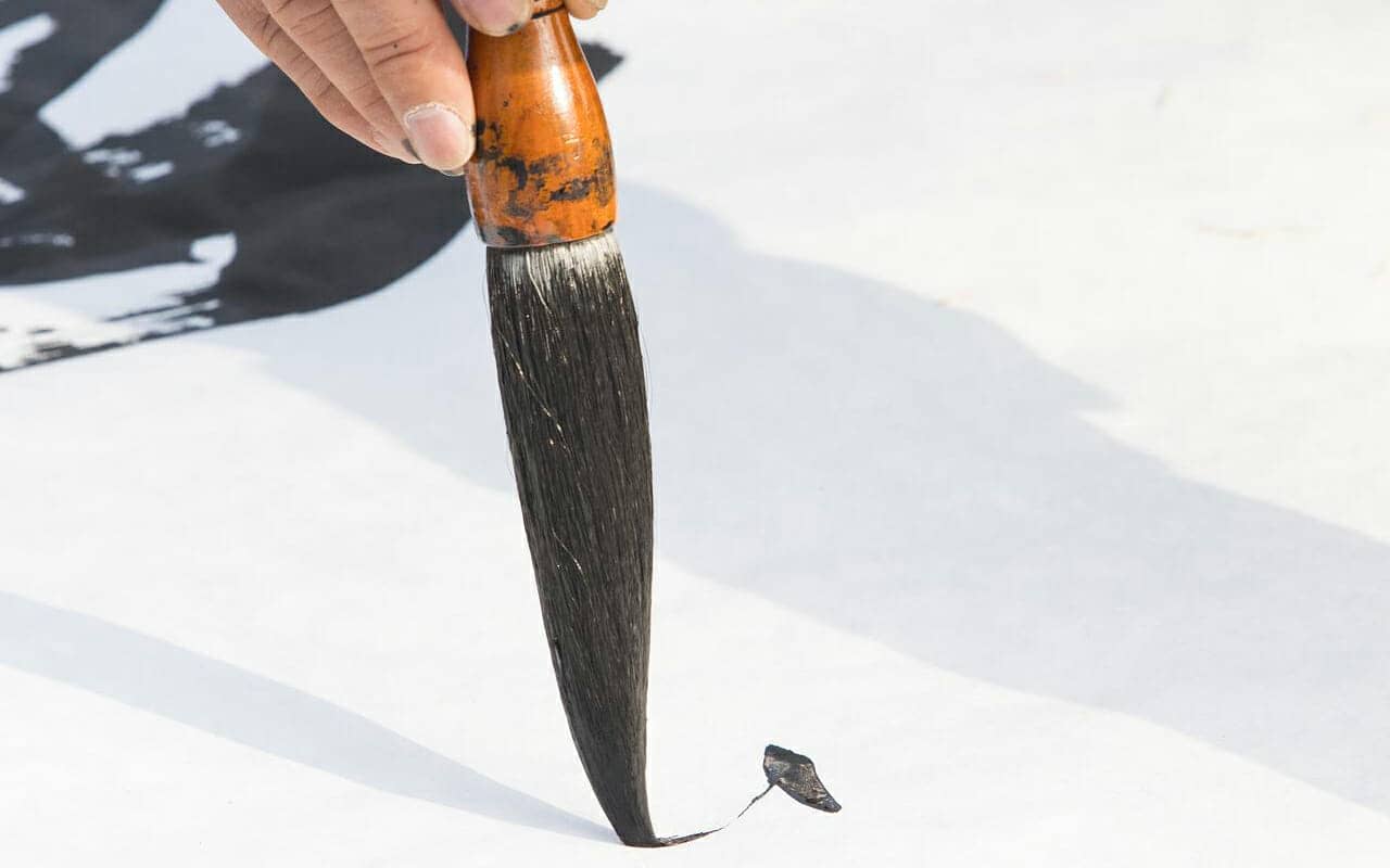 writing chinese characters with ink